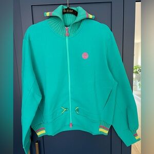 Sportalm Women's turquoise sports Jacket. Size 12. Pockets and toggles for fit.